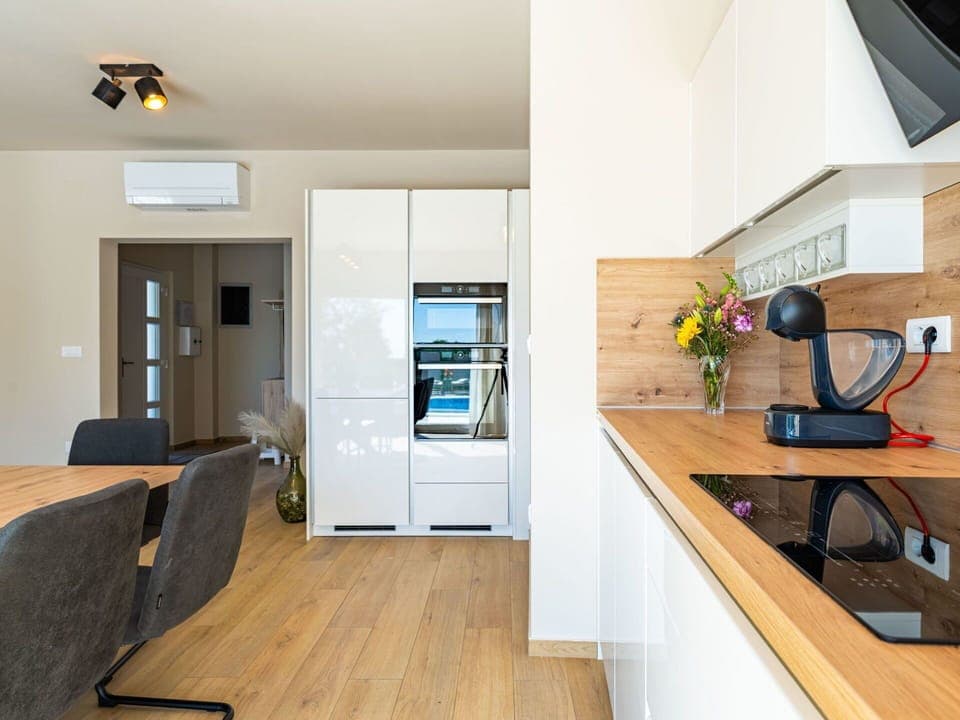 Furniture, Interior Design, Flooring, Countertop, Wall, Floor, Wood, Ceiling, Kitchen, Cabinetry