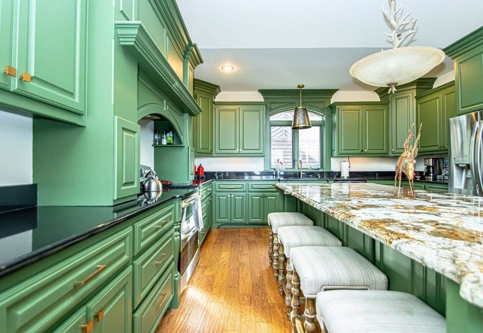 Take a Seat on One of the Barstools at the Island for a Quick Morning Bite