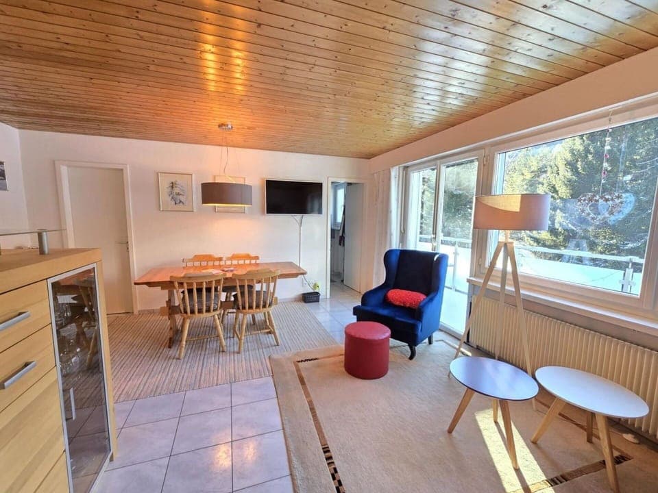 Furniture, Interior Design, Flooring, Floor, Wood, Ceiling, Room, Chair, Lighting, Table