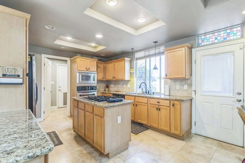 Cook your favorite meals with ease in a bright, open kitchen with all the essentials.