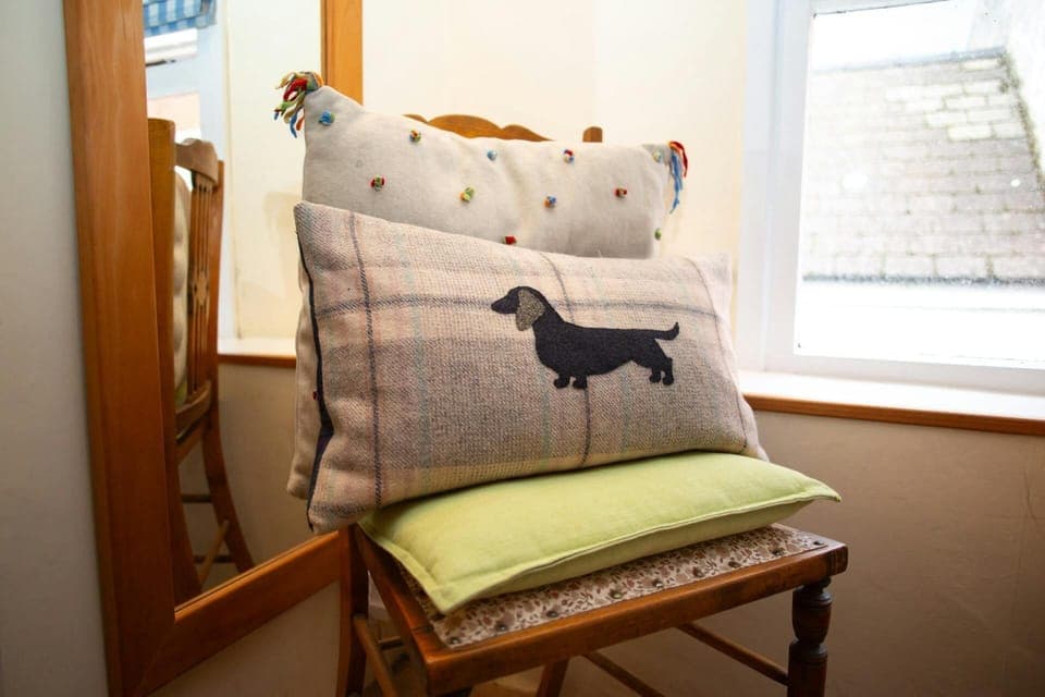 Decorative chair with cushions and mirror