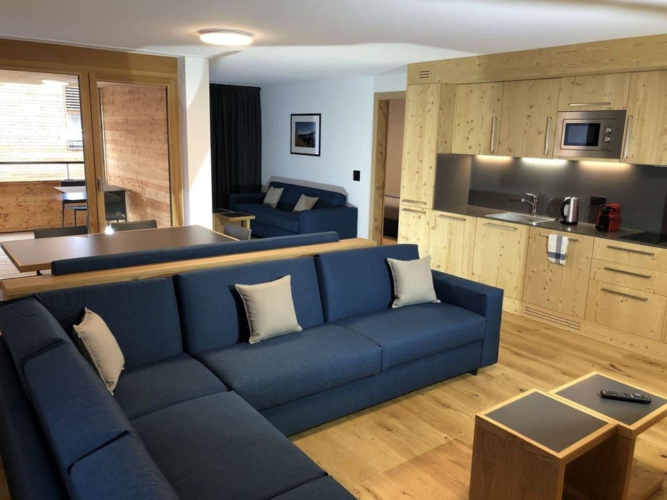 Couch, Table, Furniture, Property, Studio Couch, Interior Design, Living Room, Wood, Architecture, Flooring