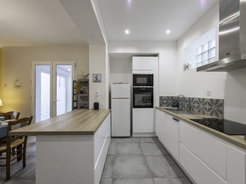 Cabinetry, Furniture, Countertop, Interior Design, Wood, Kitchen, Architecture, Kitchen Appliance, Door