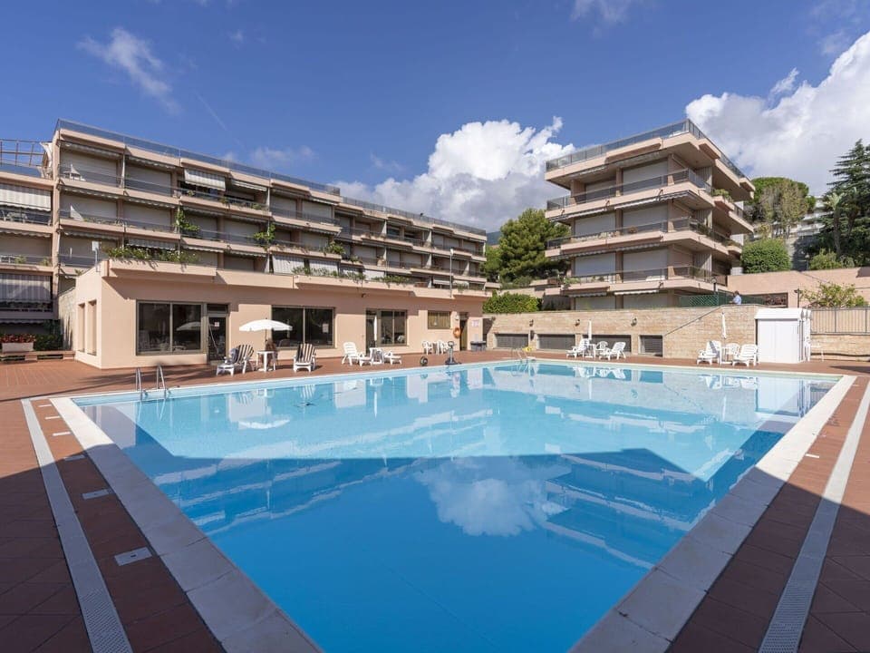 Cloud, Sky, Water, Building, Swimming Pool, Azure, Shade, Outdoor Furniture, Condominium, Tree