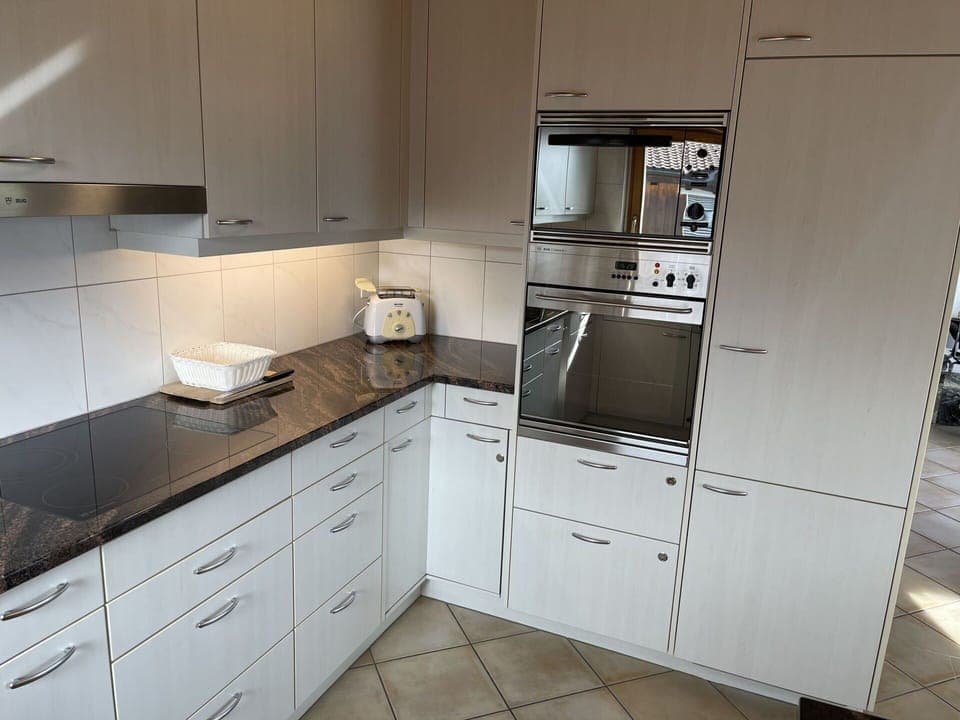 Cabinetry, Countertop, Property, Building, Drawer, Kitchen Appliance, Kitchen Stove, Kitchen, Wood, Interior Design