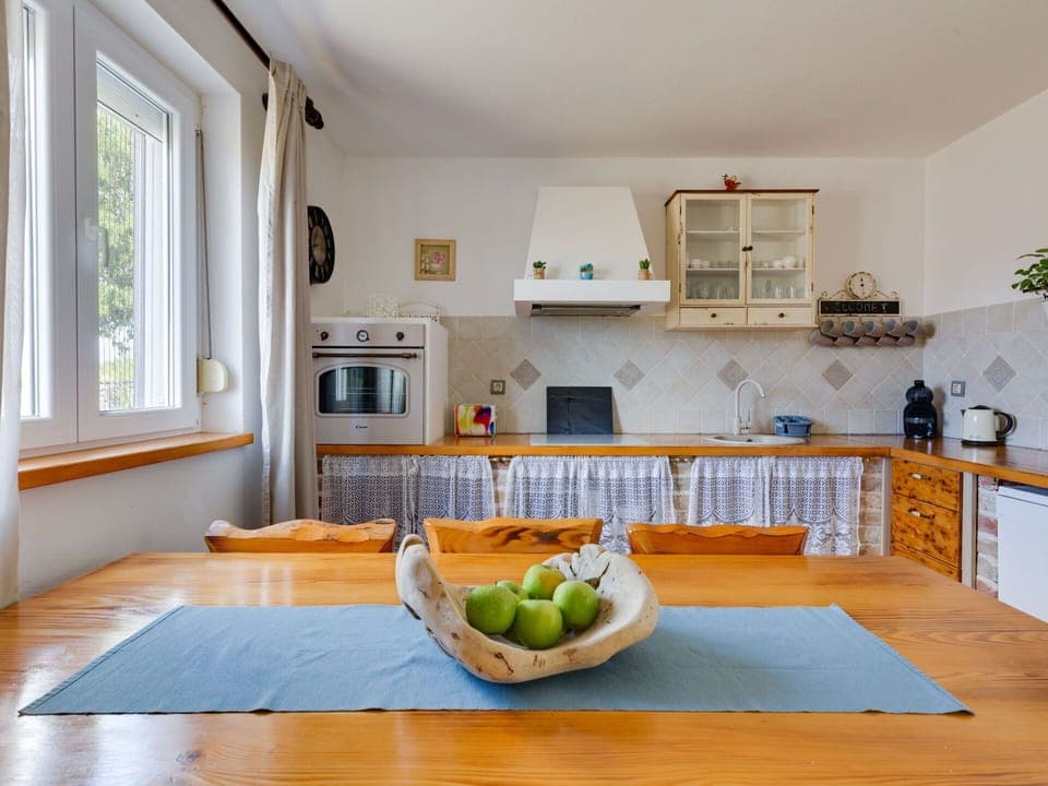 Furniture, Property, Cabinetry, Table, Window, Countertop, Azure, Wood, Interior Design, Kitchen