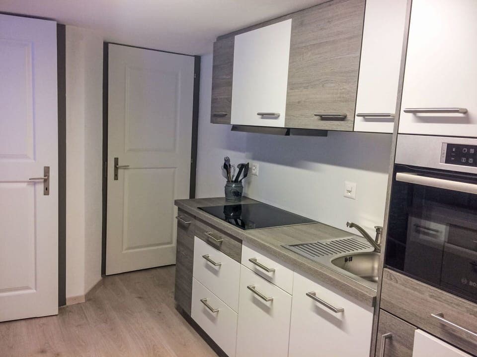 Cabinetry, Property, Countertop, Building, Kitchen, Kitchen Stove, Wood, Interior Design, Drawer, Door