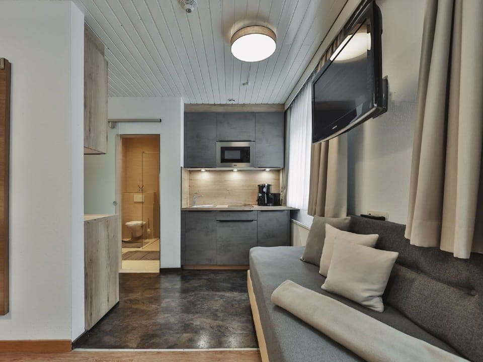 Furniture, Property, Couch, Comfort, Interior Design, Floor, Living Room, Building, Flooring, Wood