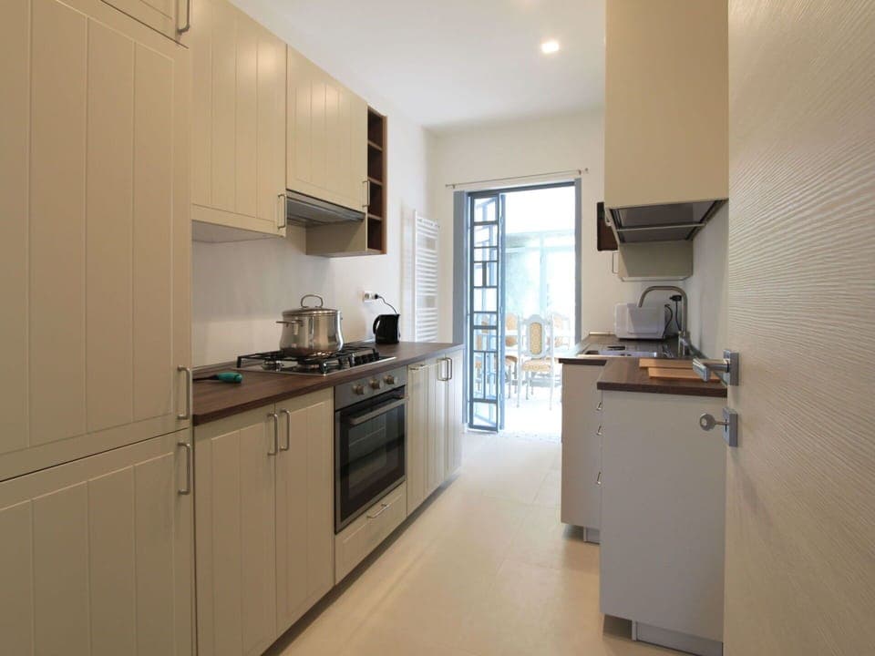 Cabinetry, Property, Countertop, Kitchen Stove, Kitchen Appliance, Sink, Wood, Kitchen Sink, Home Appliance, Kitchen