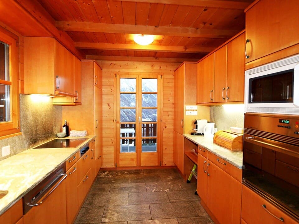 Cabinetry, Property, Countertop, Window, Kitchen, Sink, Wood, Interior Design, Lighting, Wood Stain