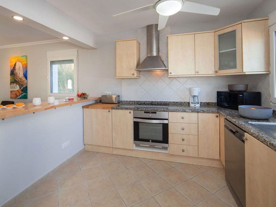 Countertop, Cabinetry, Sink, Tap, Property, Kitchen Sink, Kitchen, Plumbing Fixture, Kitchen Stove, Wood