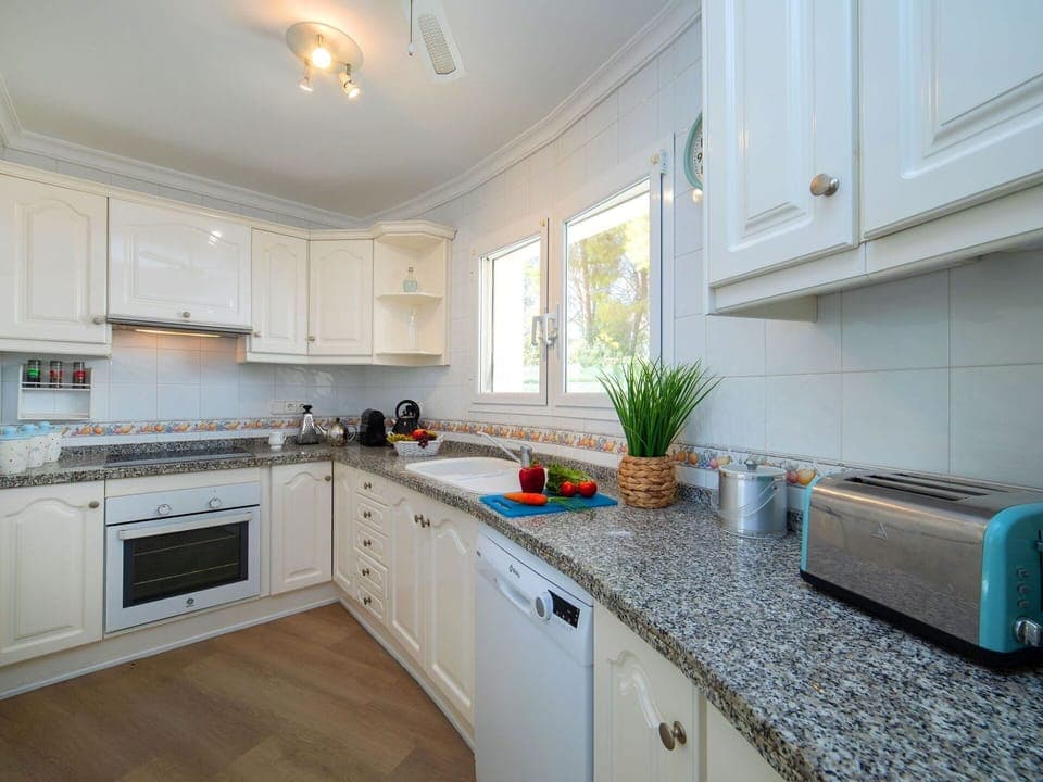 Cabinetry, Countertop, Property, Kitchen Sink, White, Building, Kitchen, Kitchen Stove, Sink, Wood