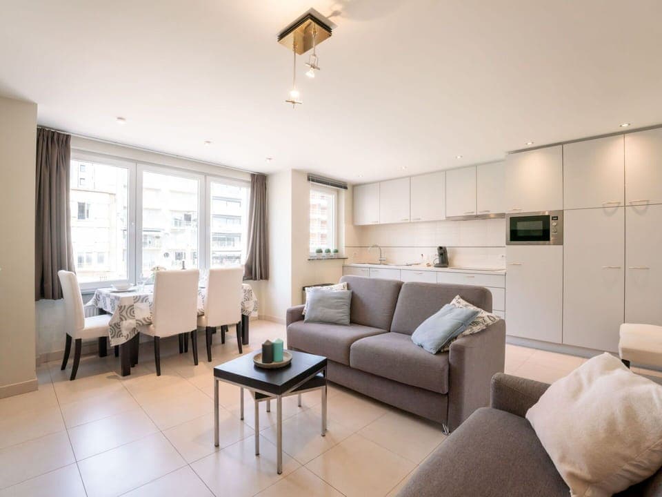 Couch, Furniture, Property, Table, Picture Frame, Window, Comfort, Lighting, Building, Interior Design