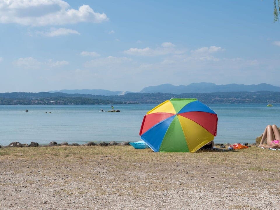 Water, Sky, Cloud, Umbrella, Beach, Coastal And Oceanic Landforms, Tree, Shade