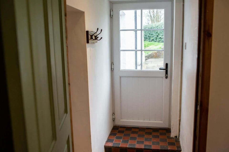Door leading from the cottage to the garden area