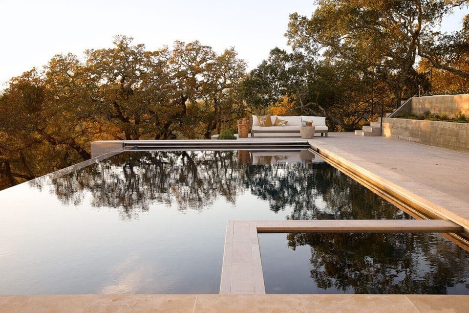 Take a dip in the luxurious infinity pool or relax in its adjoining spa