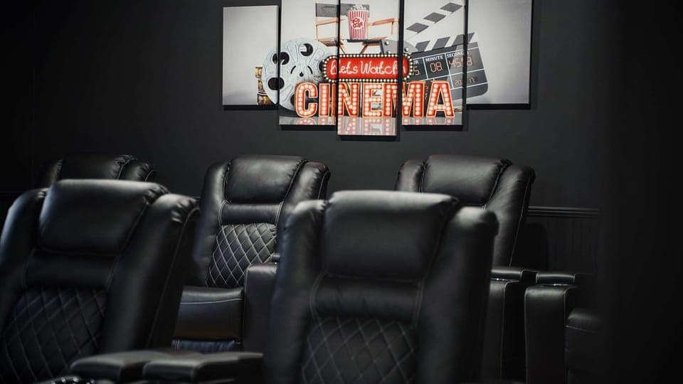 Imagine yourself reclining in luxury, popcorn in hand, enjoying a movie night in your private theater. This is where cinematic magic meets ultimate comfort.