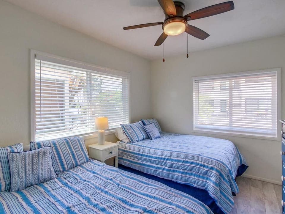 2nd bedroom with two full size beds