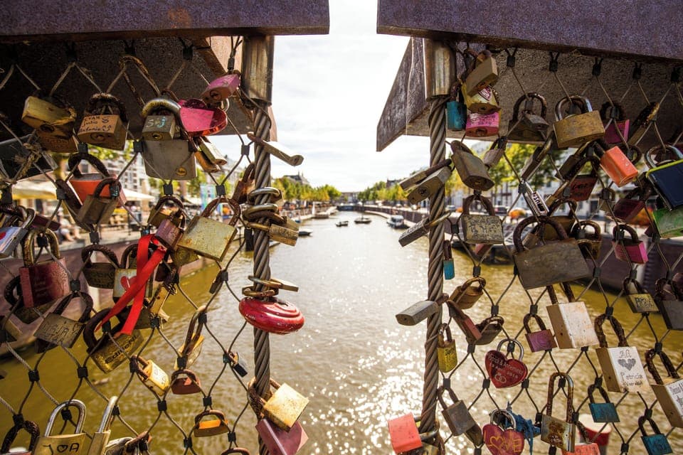 Visit Breda in Brabant and leave your love locked forever on its iconic bridge while enjoying canal views.