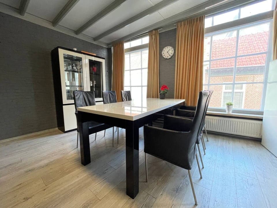 Our dining area is a welcoming space, perfect for family dinners or a relaxing breakfast to start your day