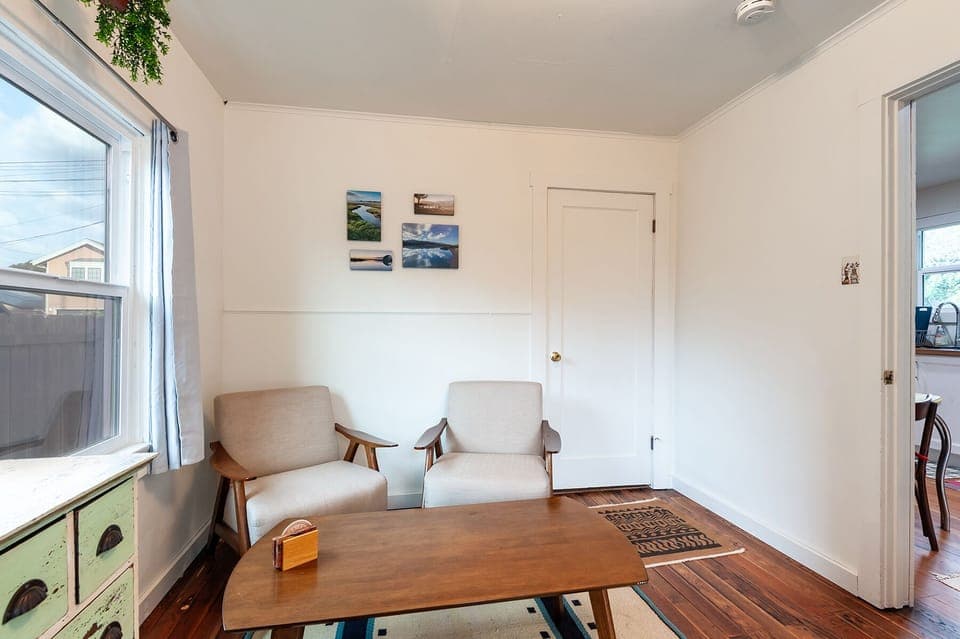Bedroom - sitting area & bathroom is behind the door