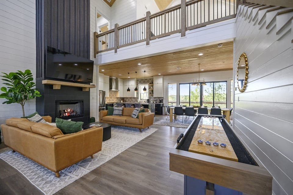 Soak in the beauty of the living area filled with natural light, or cozy up near the fireplace on a chilly night.