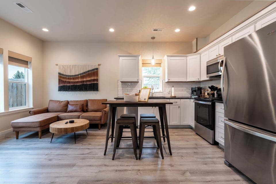 Stylish open living room filled with natural light.