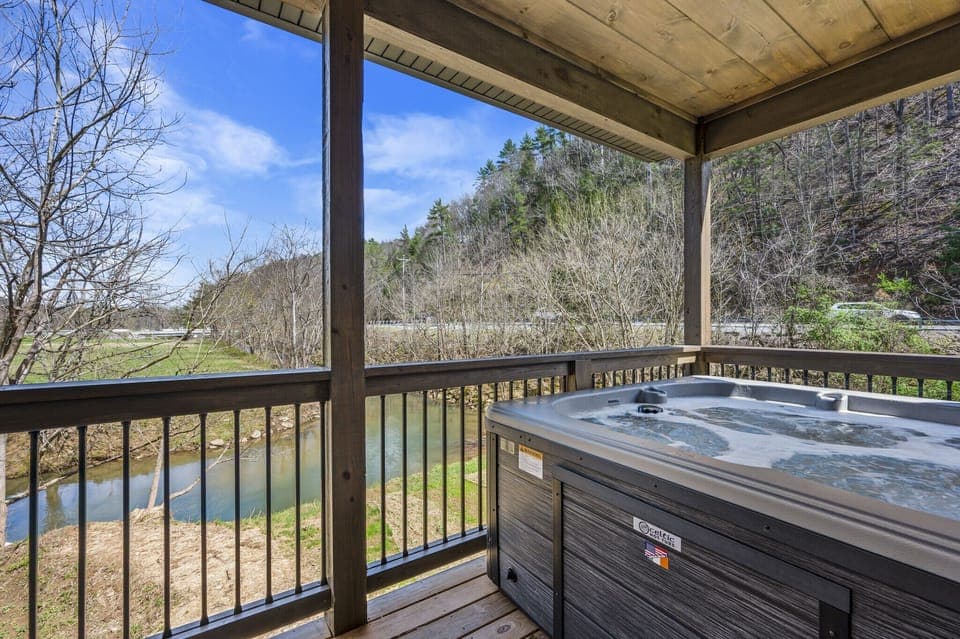 Cabin By The Creek's bubbling hot tub
