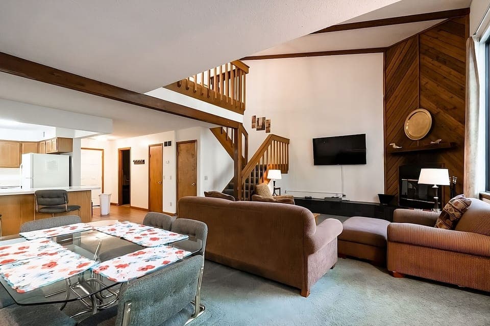 Unwind together in the airy great room with soaring ceilings.