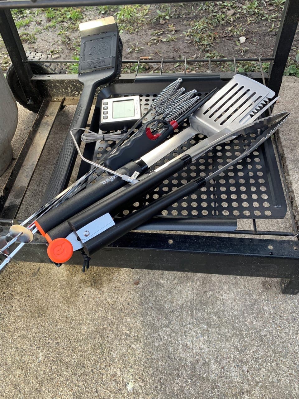 grilling utensils/tools, digital thermometer, skewers, grilling sheet