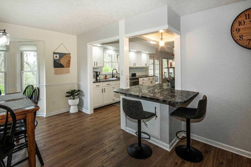 New granite bar with stools.
