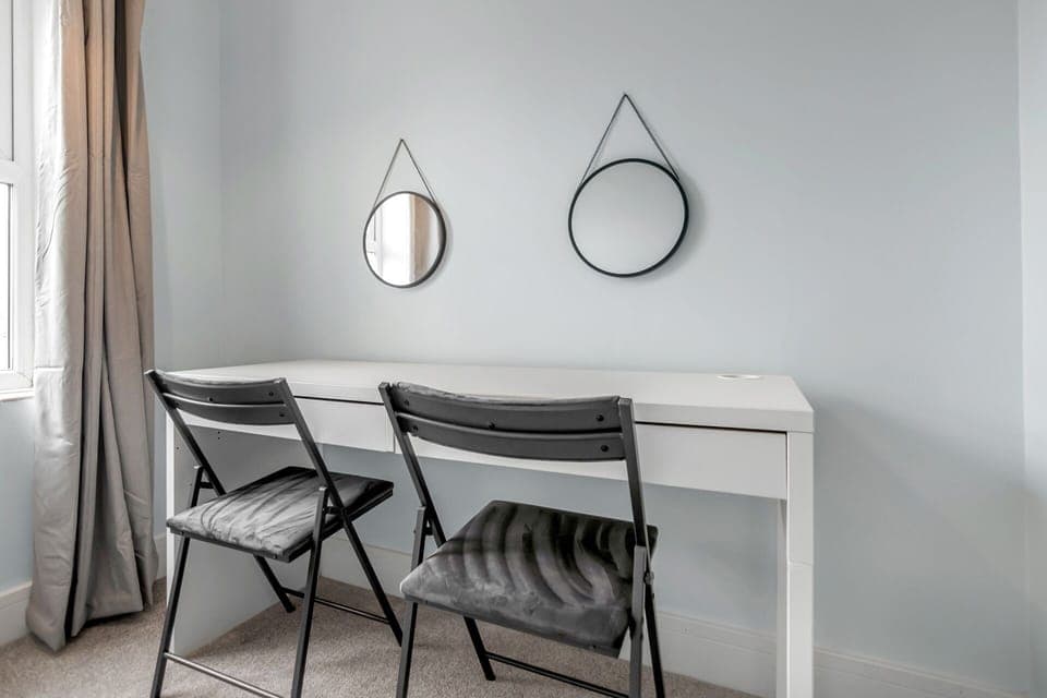 Experience a seamless blend of comfort and functionality as you redefine remote work. Welcome to your new office away from home.