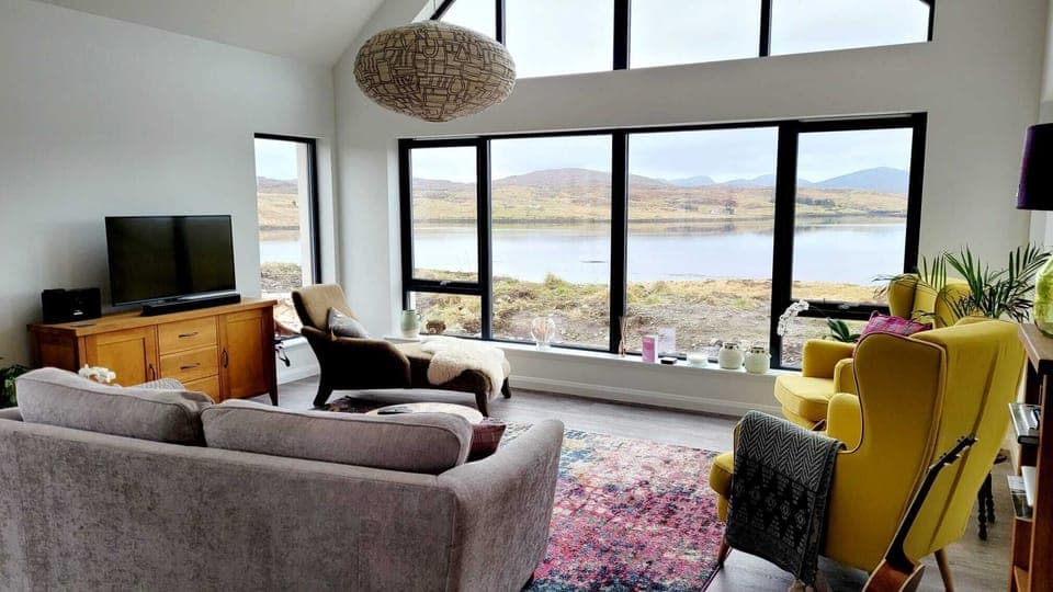 The relaxing lounge features a 2 person sofa, two comfortable arm chairs and a beautiful chaise.