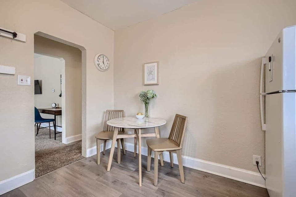 The breakfast nook gets all the light from the kitchen windows