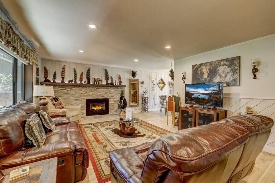 Comfy living room with electric fireplace & smart TV