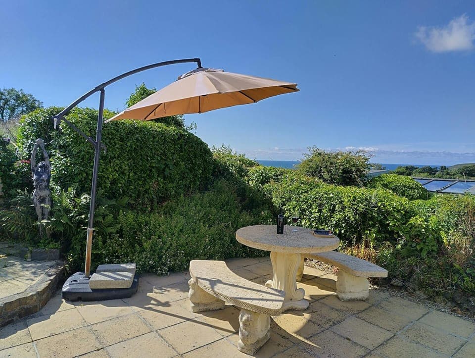 Patio table and benches with views