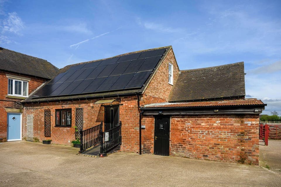 Cottage entrance also has a ramp