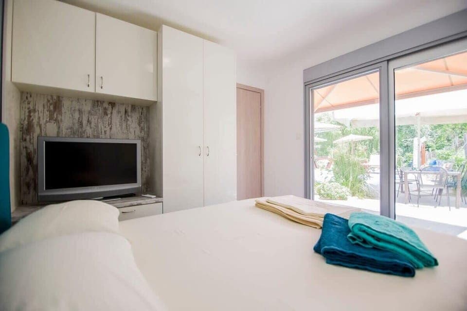 Bedroom 2: with access to the garden