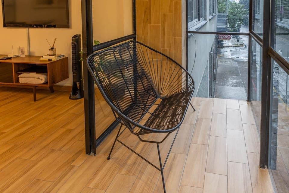 Relax in style on the balcony seating—your private corner to soak in the fresh air.