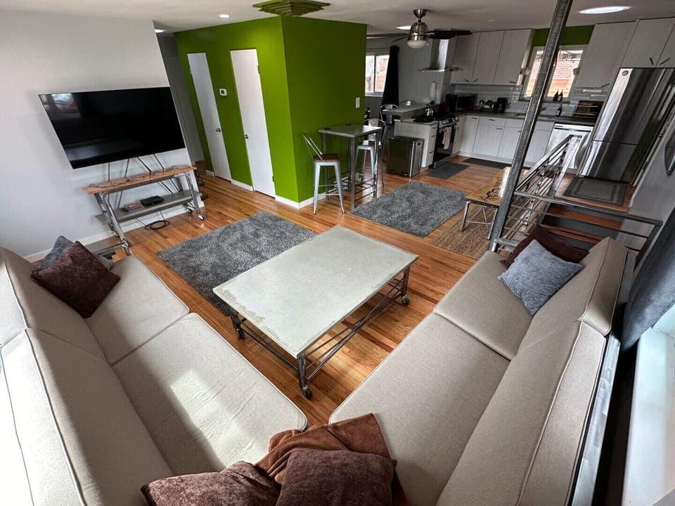 The main upstairs living room with a Smart TV. All furniture made by the owner!