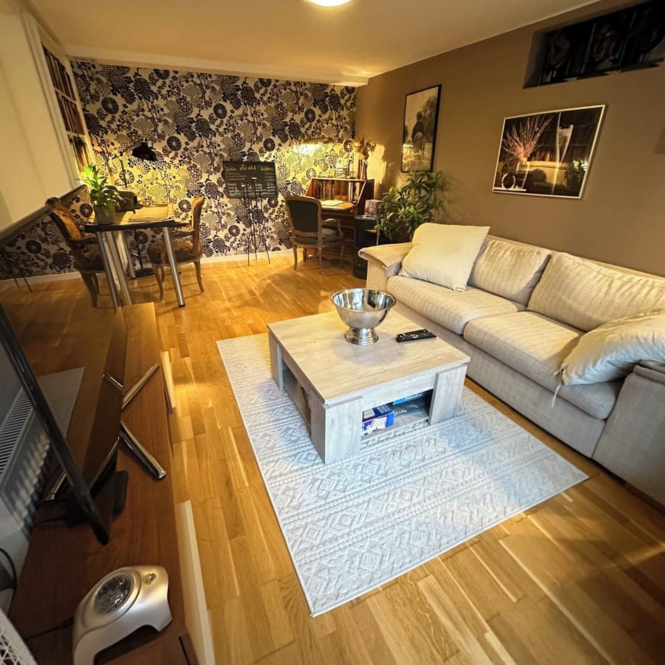 The living room has workspaces, TV, Printer, Sofa, Fireplace, books, and games.