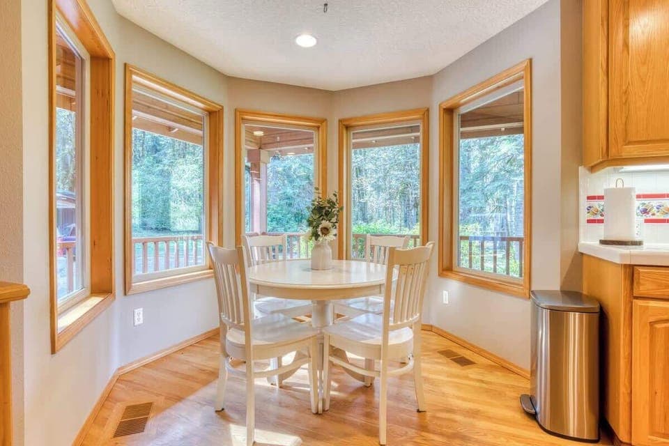 Breakfast nook in the kitchen with a table set for 4 to soak up the morning's tranquility