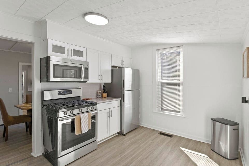 Savor the simplicity of our fully-equipped kitchen with sleek, stainless steel appliances and a fresh, clean design.
