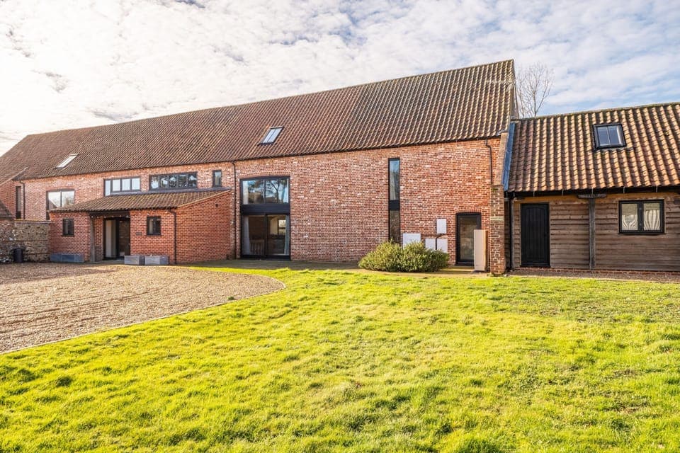 Peak Hall, Tittleshall: The original grain barn for the farm, tastefully converted