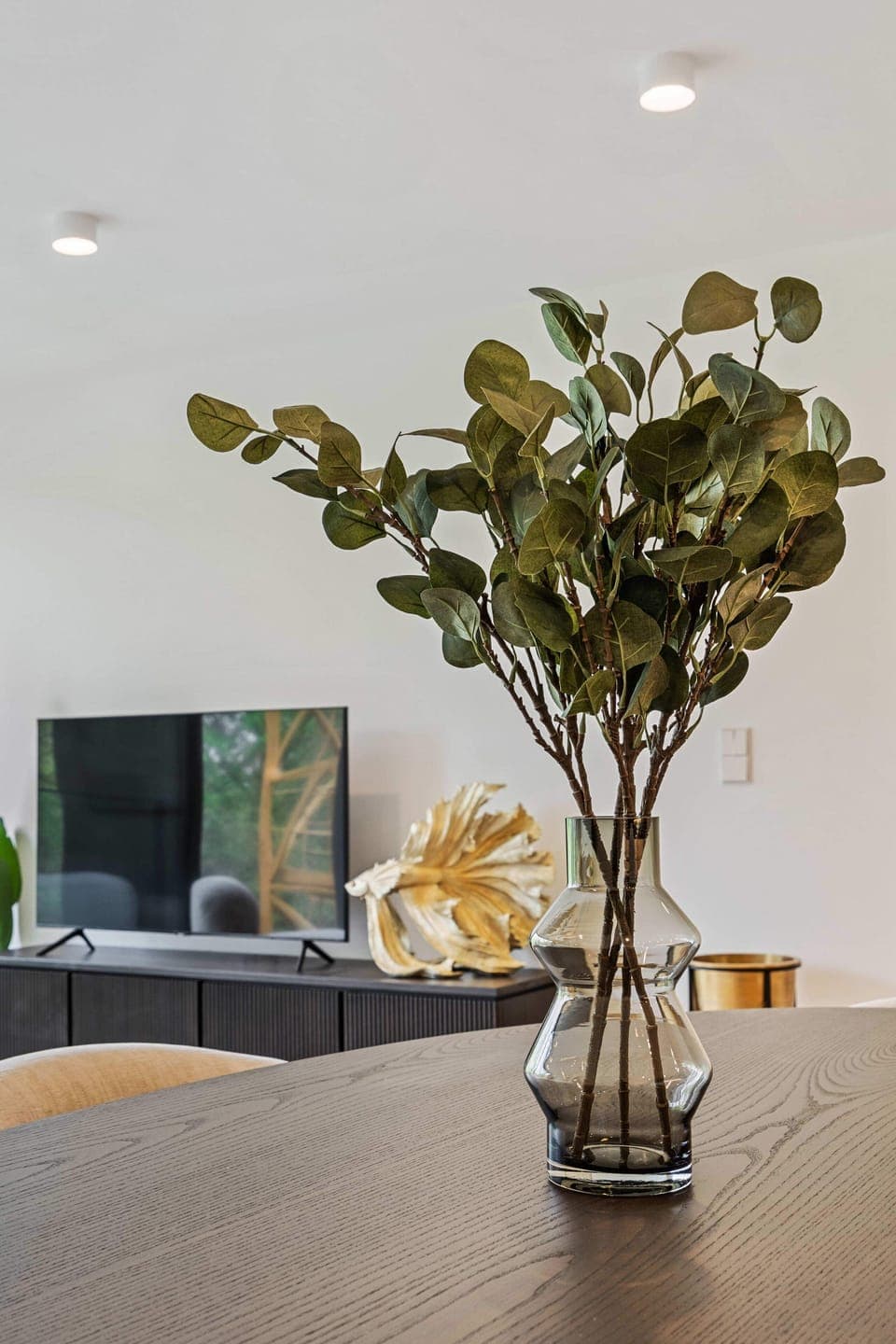 Touches of greenery bring life and calm to our contemporary living spaces.