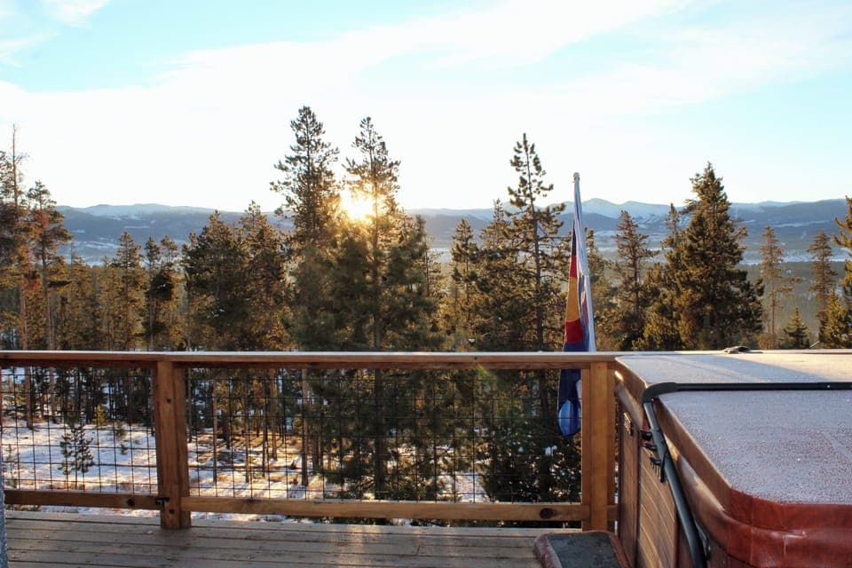 Beautiful sunrise. Hot tub on deck with amazing views.