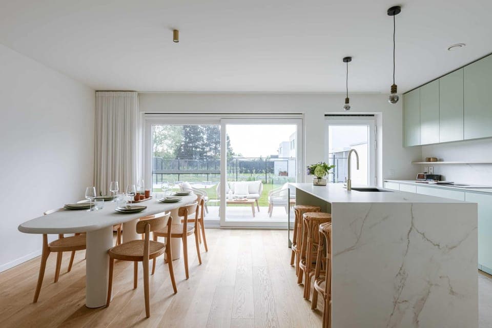 Open dining area and equipped kitchen