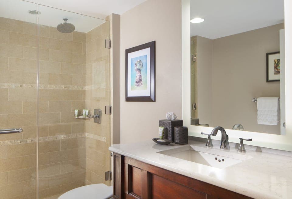 Start the day with bright vanity lighting and fresh towels.
