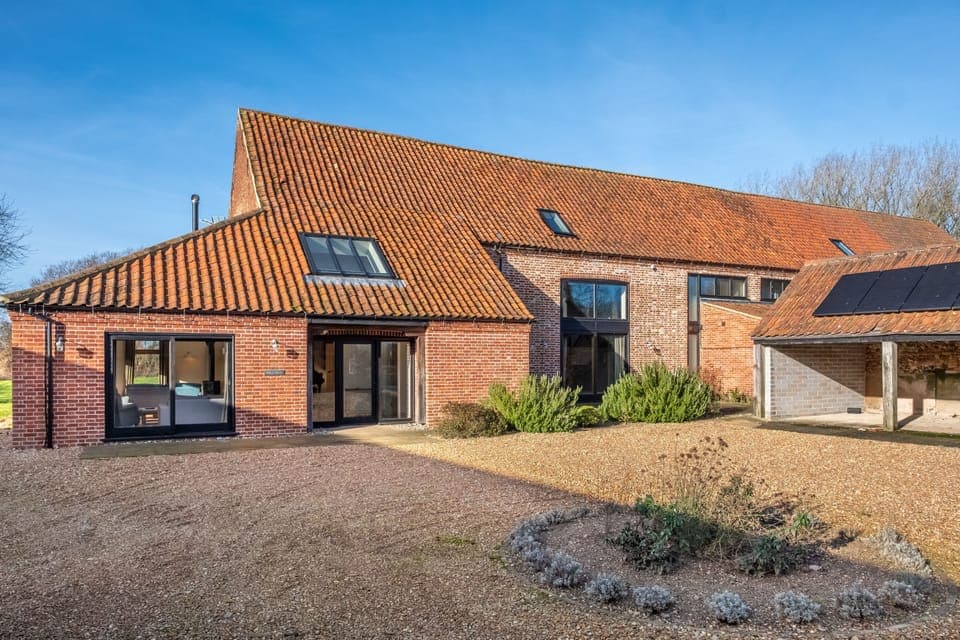 Mill Hill, Tittleshall Barns: Combining the original grain barn for the farm with two loose boxes for the working horses