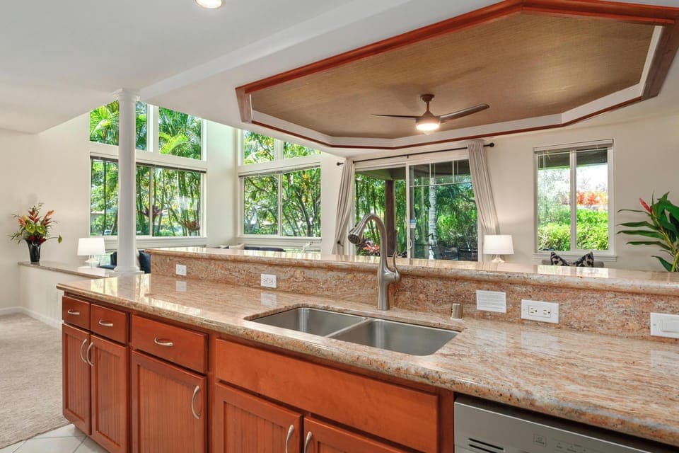 Full kitchen with granite counters and stainless steel appliances
